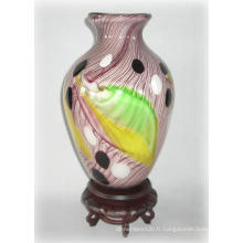 Vase en verre avec motif en plumes